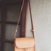 structured brown leather crossbody bag
