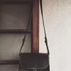 structured black leather crossbody bag